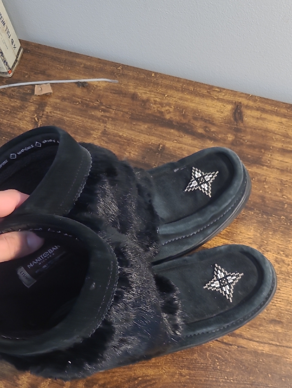 Black Faux-Fur Moccasin Slippers with Beaded Star Accent